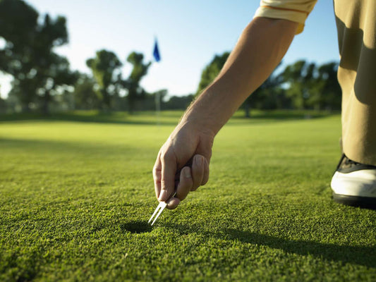 how to use a divot tool